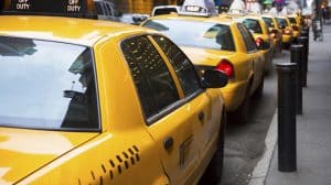 Government-backed law to require 15-minute delay on smartphone ride services irks Parisians