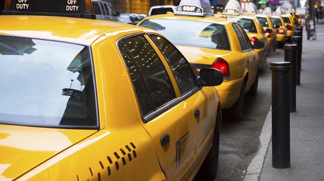Government-backed law to require 15-minute delay on smartphone ride services irks Parisians