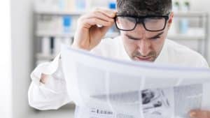 Man reading papers