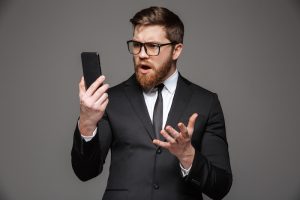 confused man on phone