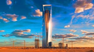 Illustration of the Jeddah Tower rising above the desert skyline as the world's tallest skyscraper.