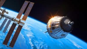 Illustration of the Cygnus XL spacecraft approaching the International Space Station.