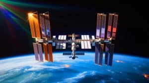 Illustration of the International Space Station orbiting Earth after a successful reboost by NASA and SpaceX.