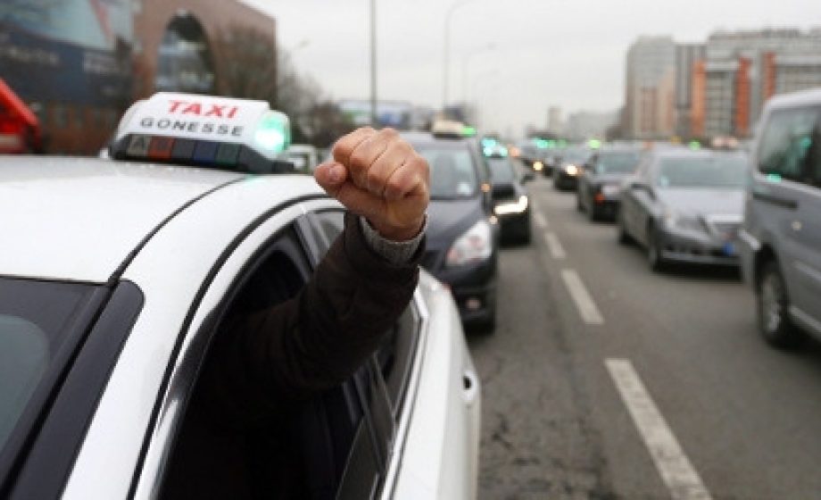 Taxi protest in Paris turns to guerrilla warfare as Uber car attacked on freeway